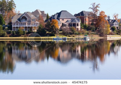 stock-photo-expensive-homes-on-lakefront-property-in-the-suburbs-45474175.jpg